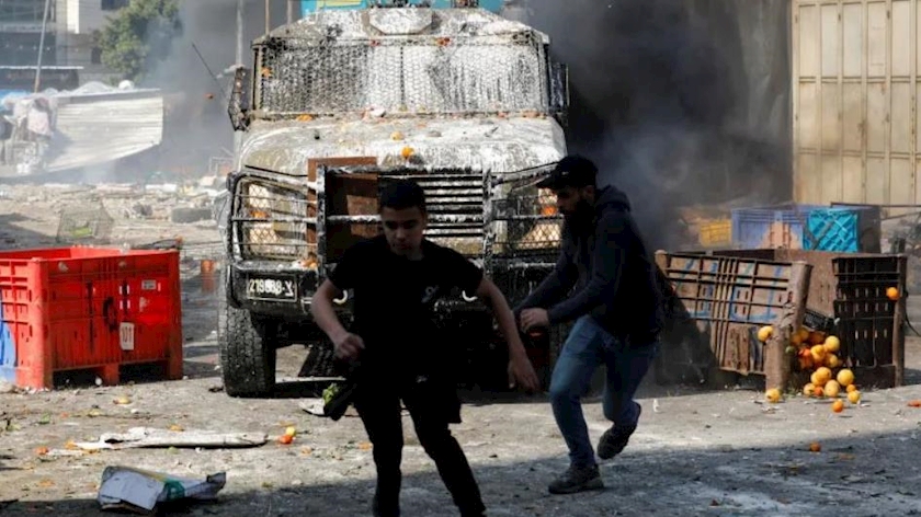 Iranpress: Ten Palestinians killed, 100 injured in Israeli raid in Nablus 