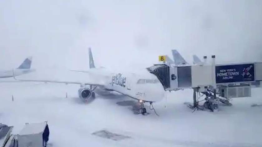 Iranpress: More than 4000 flights canceled or delayed as winter storm hits US