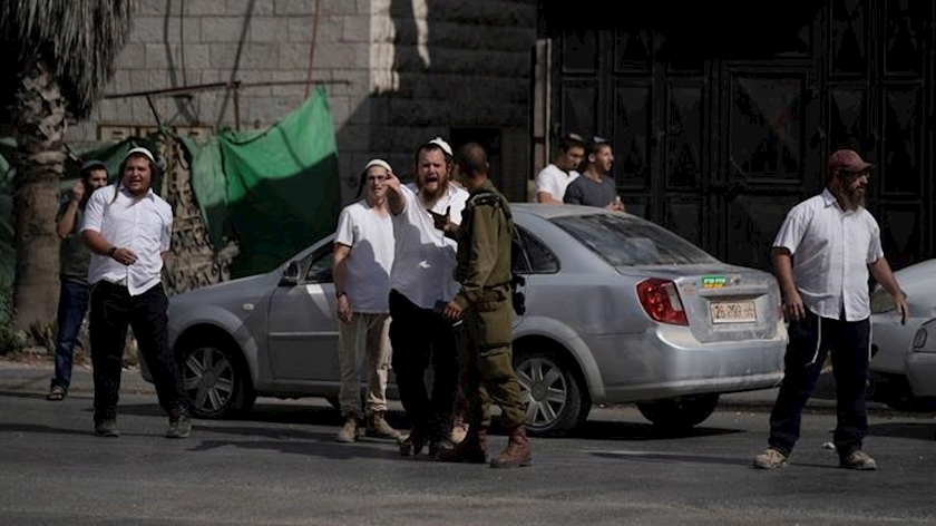 Iranpress: Israeli settlers raid Huwara, injuries reported among Palestinians