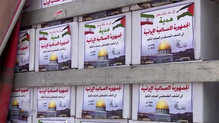 Iranpress: Iran distributes food packages in Palestinian camp of Yarmouk
