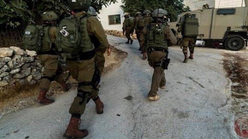 Iranpress: Israeli forces arrest 11 Palestinians in West Bank