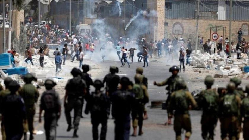 Iranpress: West Bank clashes leave 33 Palestinian injured
