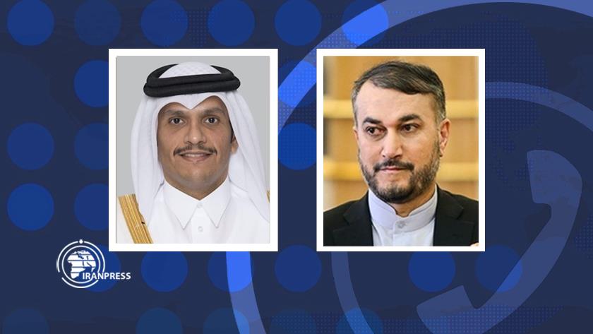 Iranpress: Iran-Qatar FMs confer on latest developments in regional, int