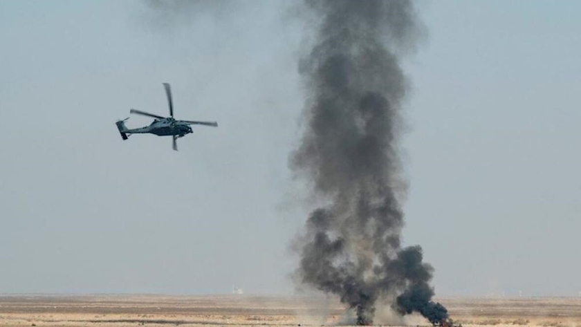 Iranpress: US Army grounds its aircrafts after Apache helicopters collision