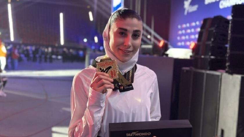 Iranpress: Iranian woman brings gold in Baku Taekwondo C