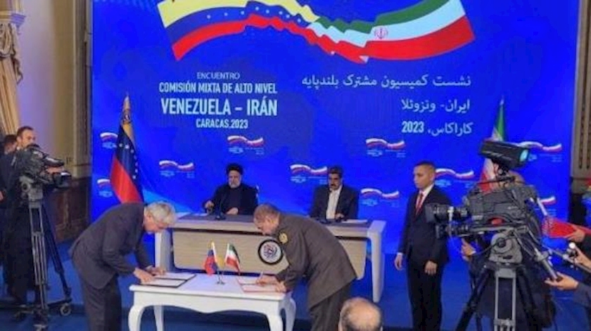 Iranpress: Iran, Venezuela sign 19 cooperation agreements
