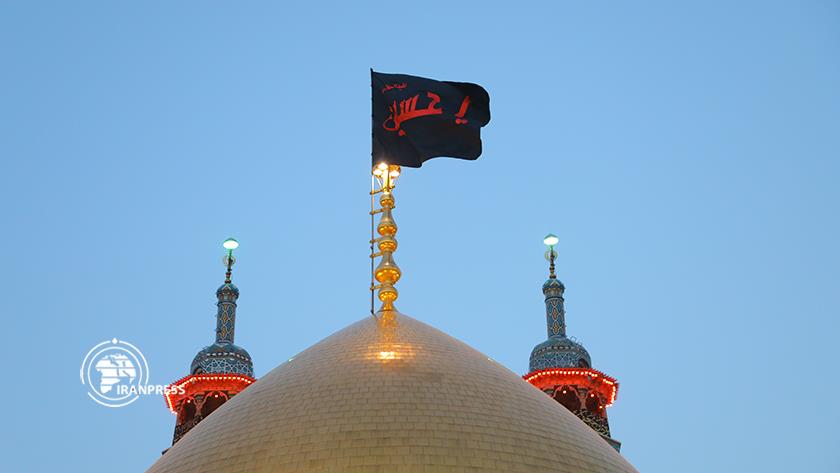 Iranpress: Hazrat Masoumeh holy shrine covered in black 