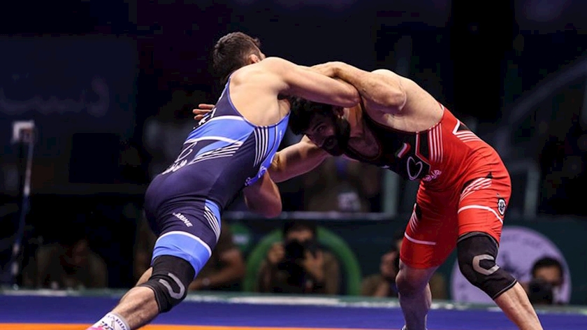 Iranpress: Iranian FS wrestlers bag 4 medals in Amman Championships