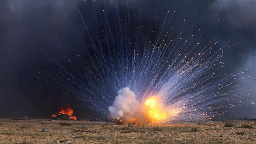 Iranpress: Israeli drones massive airstrikes on two observation posts in Gaza