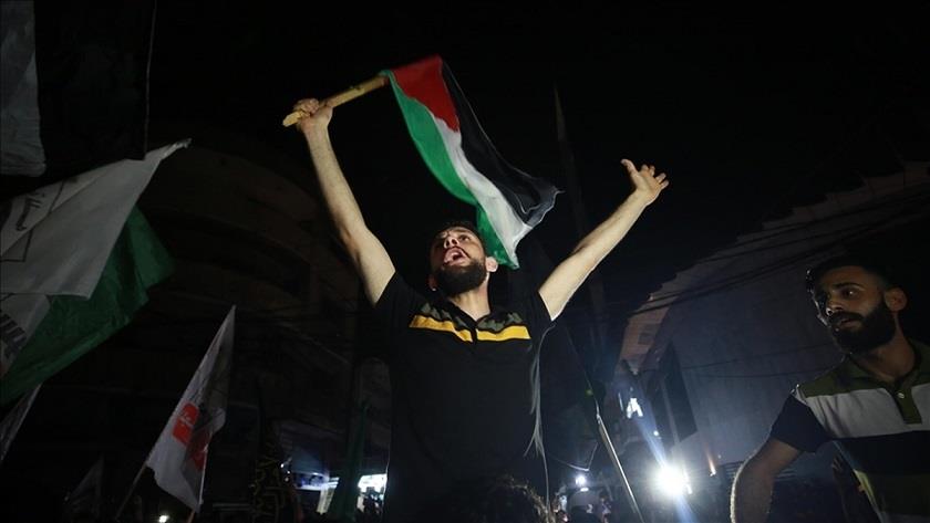 Iranpress: Gazans rejoicing after release of latest Qatar