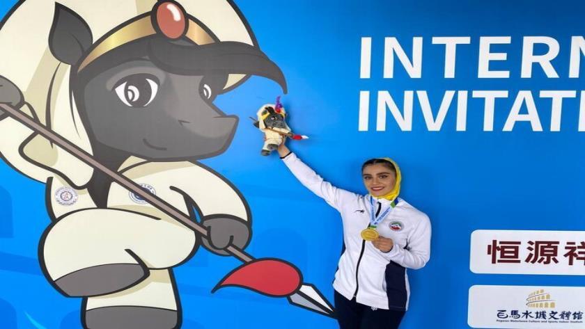 Iranpress: Iranian girl wins gold of Wushu World Cup qualifier
