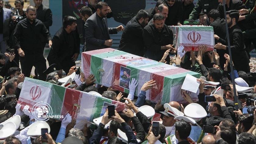 Iranpress: Photo: Martyred President Raisi laid in rest in Imam Reza