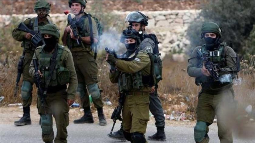 Iranpress: Zionists shot young Palestinian man in Jenin