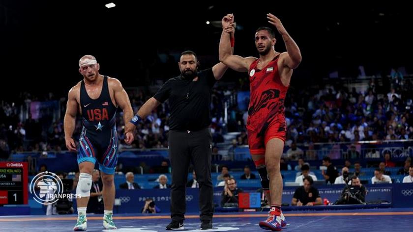 Iranpress: Iranian Free-Style Wrestler Wins Over US, Competitions Wraps Up