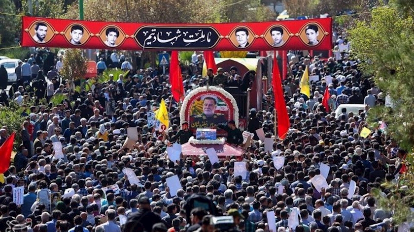 Iranpress: Iranian Commander Nilforoushan Laid to Rest as Tens of Thousands Attend Ceremony