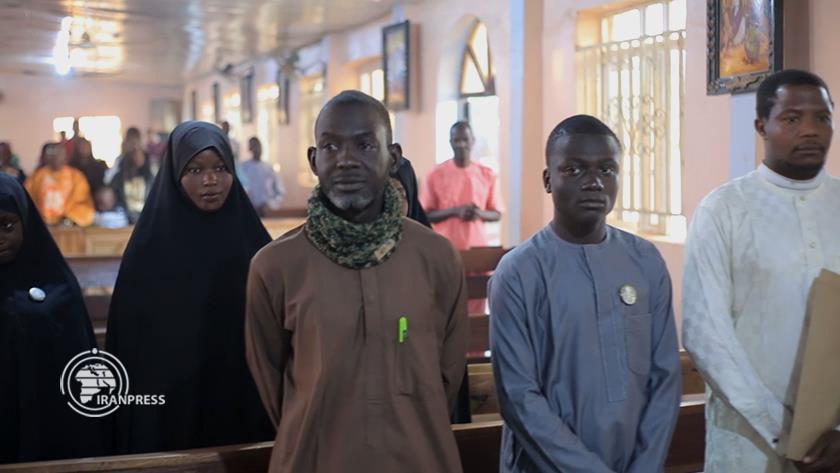 Iranpress: Muslim Youth in Nigeria Attend Church Services, Spreading Leader