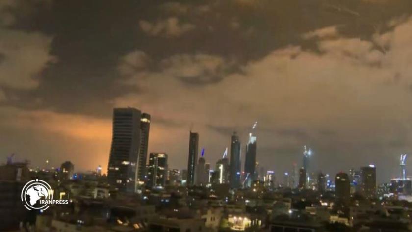 Iranpress: Fresh Wave of Iranian Missiles Hit Haifa, Power Plant on Fire