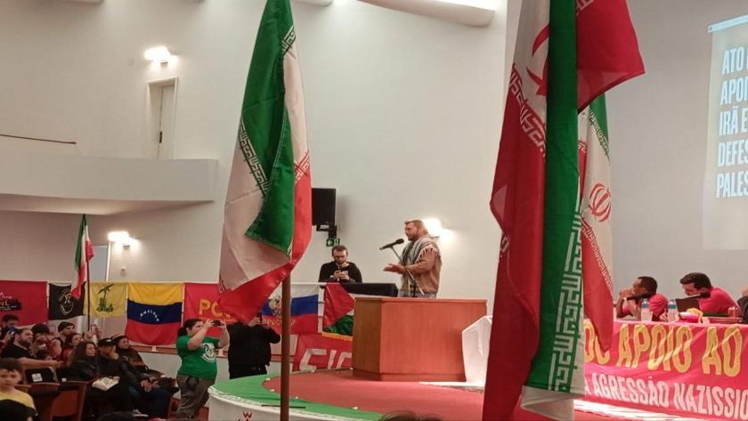 Iranpress: Brazilian Express Solidarity With Iran, 30-meter Iranian Flag on Historic Bridge