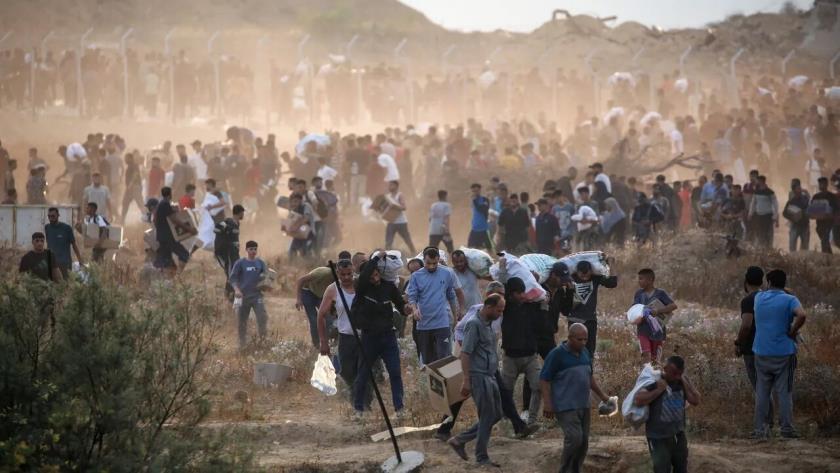 Iranpress: Over 60 Killed in Gaza Aid Massacre: Hamas Blames U.S., Israel for Systematic Murder