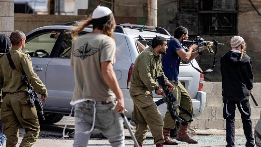 Iranpress: Israeli Forces, Settlers Escalate Overnight Raids in West Bank
