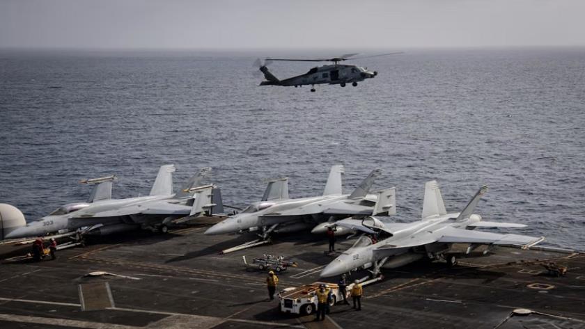 Iranpress: U.S. Navy Fighter Jet, Helicopter Crash Minutes Apart in South China Sea