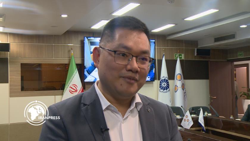 Iranpress: Chinese Activist Highlights Iran-China Economic Cooperation at Tehran Forum