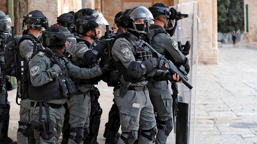 Iranpress: Israeli Police Crack Down on Christmas Celebrations in Occupied Haifa