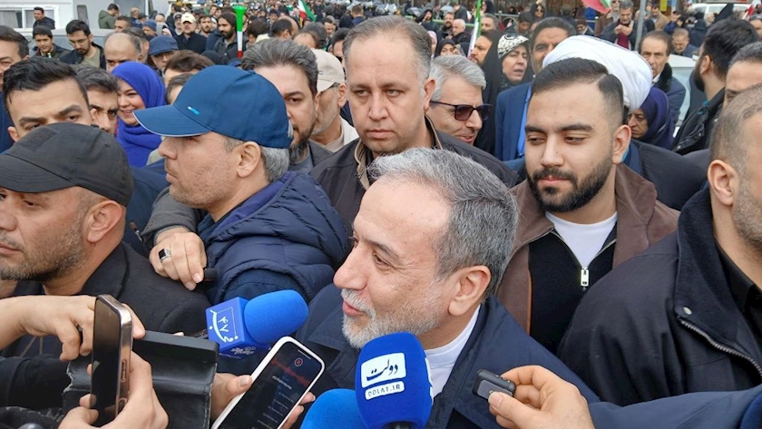 Iranpress: Iranian Officials March With Nation On Revolution Anniversary