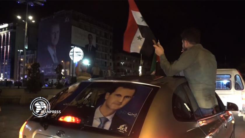 Iranpress: Les Syriens célèbrent la victoire de Bachar al-Assad à l