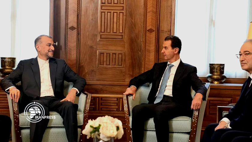 Iranpress: Le haut diplomate iranien et le président syrien discutent des relations bilatérales
