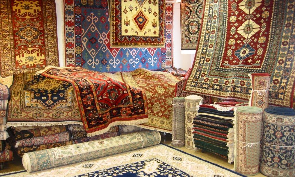 Iranian carpets, rugs exhibited in a local market